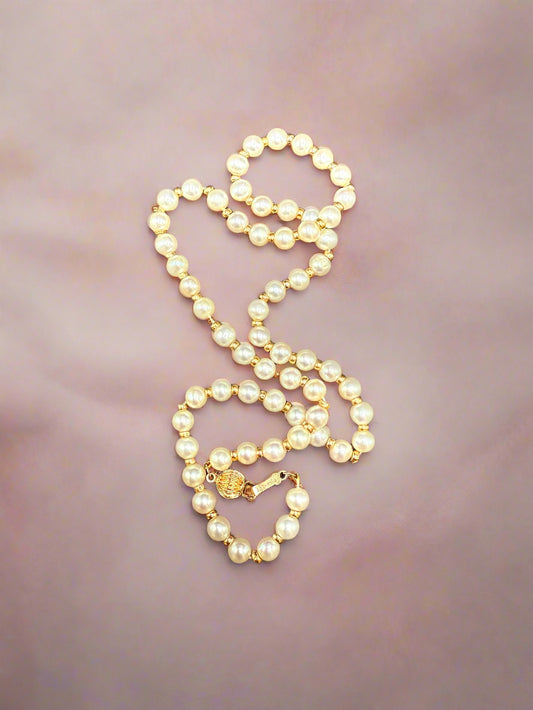 Pearl necklace on a dark background