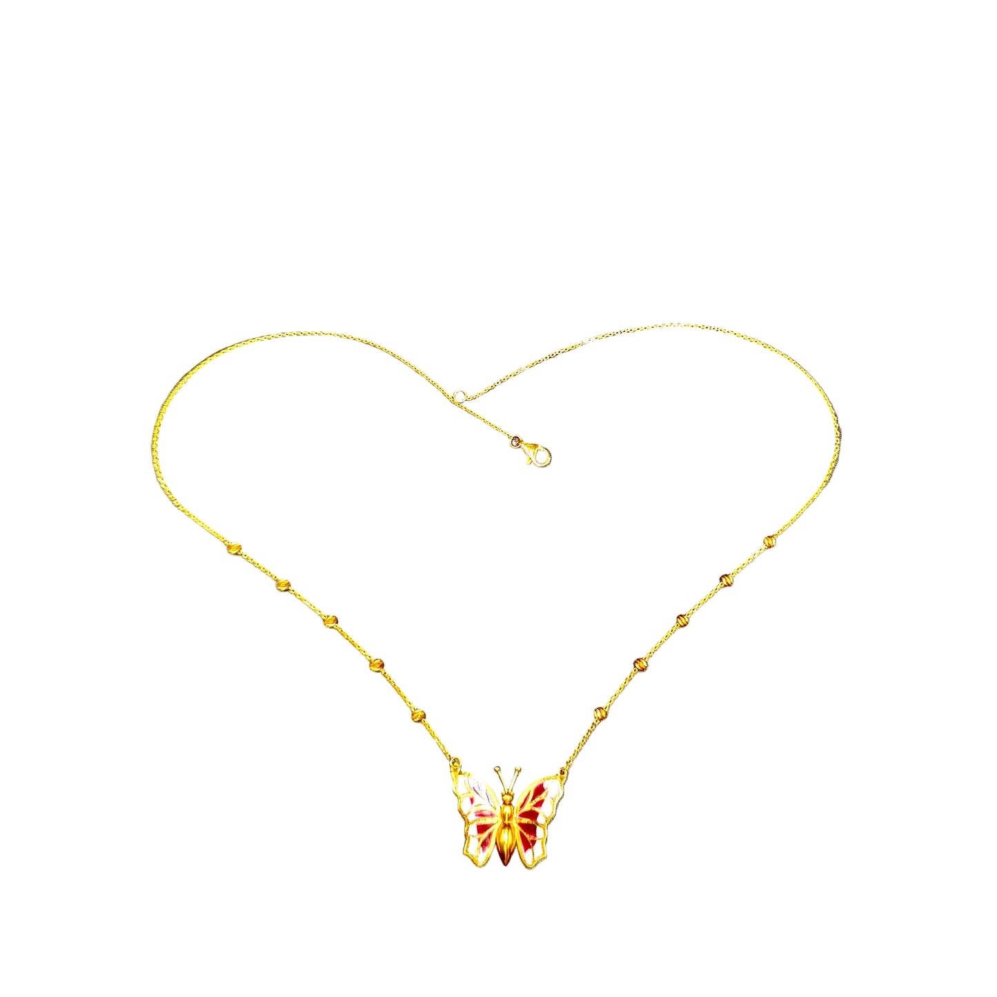 Gold necklace with a butterfly pendant on a gray background