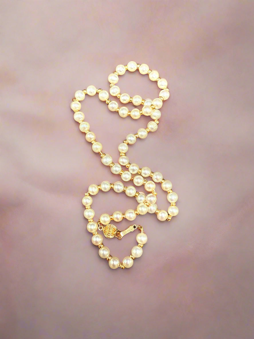 Pearl necklace on a dark background